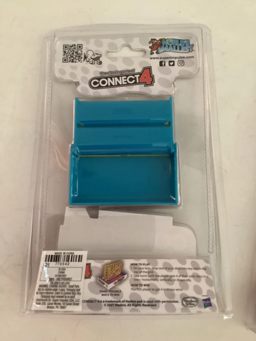 Set of 2 Worlds Smallest Classic Games: Scrabble & Connect Four